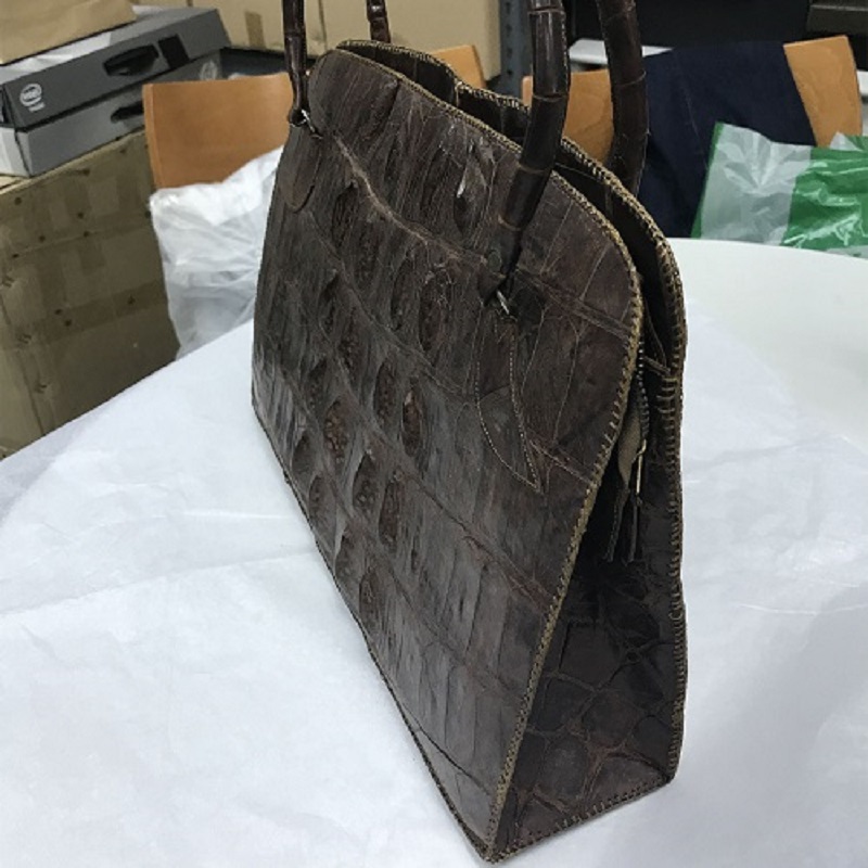 Side of the handbag with minor cracks